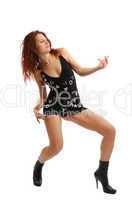 Cool woman dancing in black isolated on white