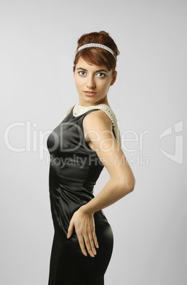 Slim figure of elegant woman in black