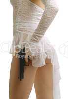 Woman in white with gun, side view