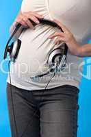 pregnant woman with headphones