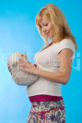 pregnant woman with toy