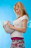 pregnant woman with toy