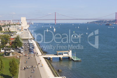 wide river with yachts and bridge