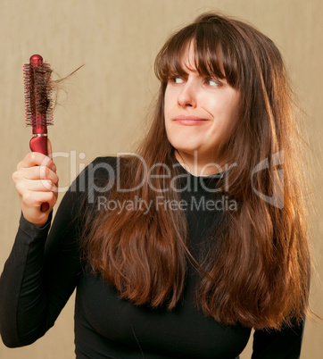 Confused woman with tangled hair