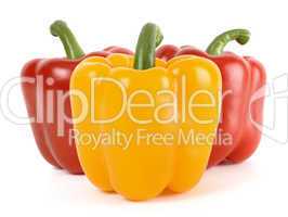 Three bell peppers: one yellow and two red behind