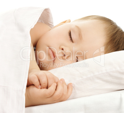 Cute child is sleeping in bed