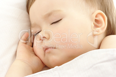 Cute child sleep with hand under his cheek