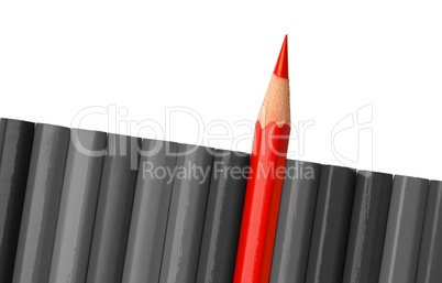 Single red crayon is sticking out of the gray row