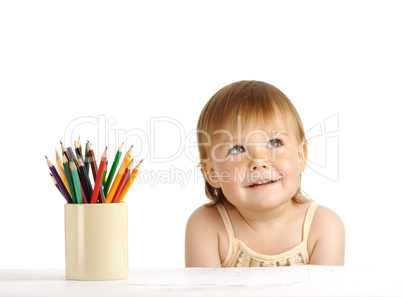 Child with bunch of color crayons