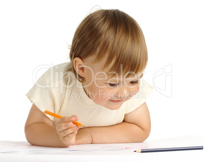Child draw with orange crayon