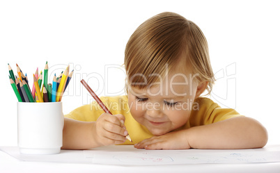 Child draw with crayons