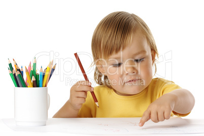 Child points on his drawing