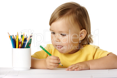 Child thinks about drawing ideas