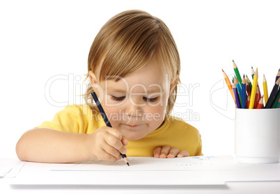 Child draw with crayons