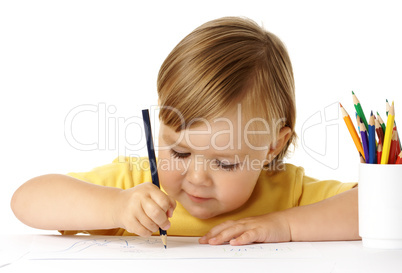 Child draw with color crayons