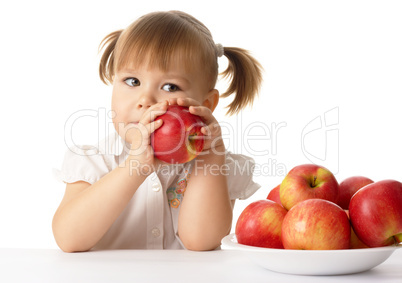 Cute child with apples