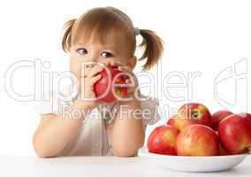 Cute child with apples