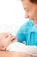 Happy father smile to his child