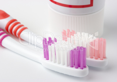 Two toothbrushes and toothpaste