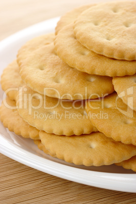 Yellow crackers on plate