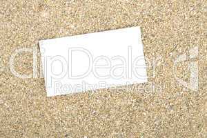 Businesscard on sand