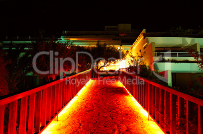 Illuminated way from the beach to hotel building, Crete, Greece