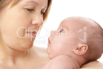 Cute newborn in mother's hands