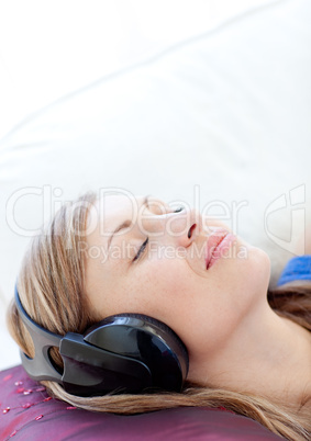 Close-up of a relaxed woman listening music
