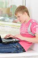 teenager with laptop