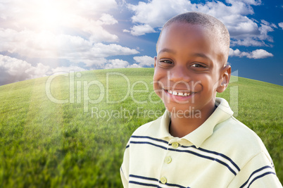 Handsome African American Boy Over Grass and Sky