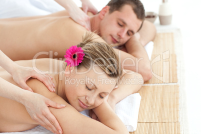 Relaxing couple having a massage