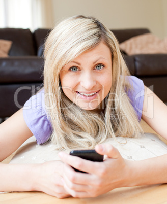 Radiant woman sending a text