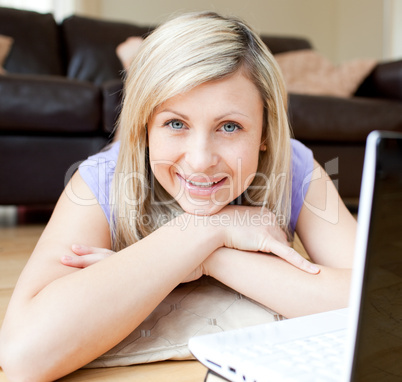 Portrait of a beautiful woman using a laptop