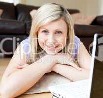 Portrait of a beautiful woman using a laptop