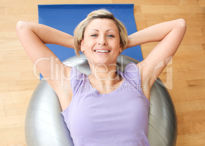 Joyful woman doing exercice