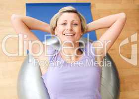 Joyful woman doing exercice