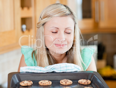 Delighted housewife preparing cookies