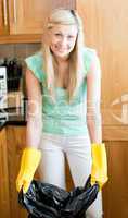 Smiling housewife cleaning