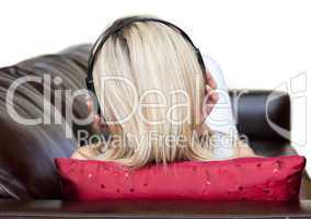 Young woman using headphones