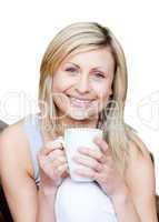 Beautiful woman holding a cup of coffee