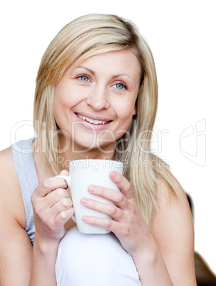 Attractive woman holding a cup of coffee