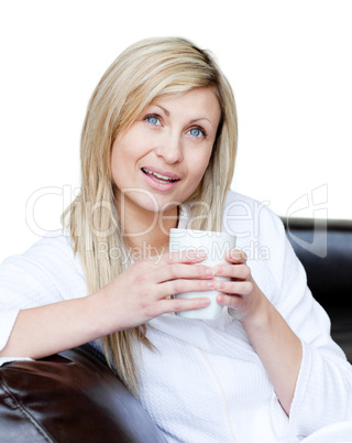 Smiling woman holding a cup of coffee