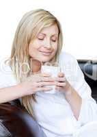 Cute woman holding a cup of coffee