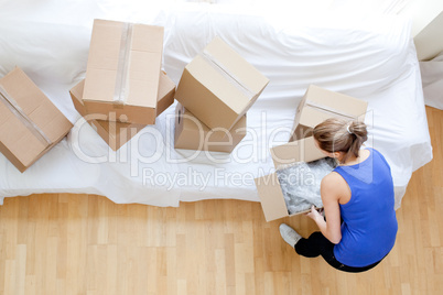 Caucasian woman holding a box