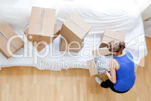Caucasian woman holding a box