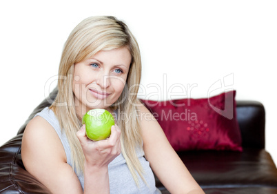 Cute woman eating an apple