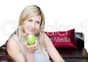 Cute woman eating an apple