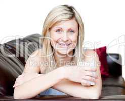 Cheerful woman holding a cup of coffee