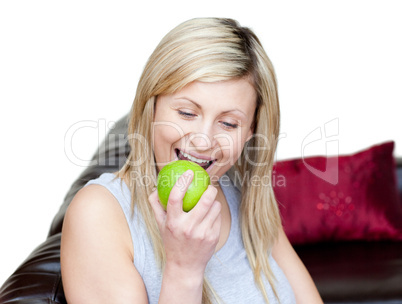 Bright woman eating an apple