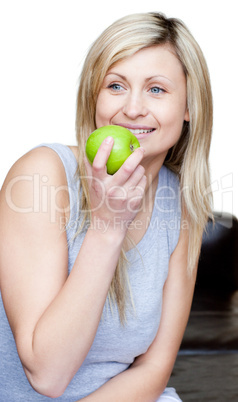 Beautiful woman eating an apple